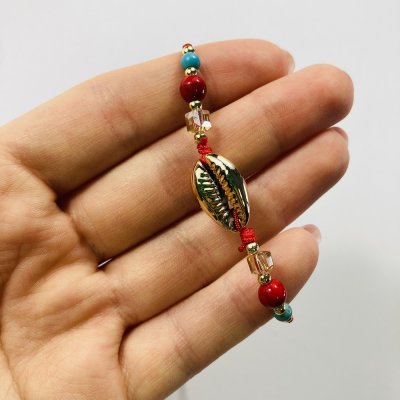 Piros kagylós karkötő